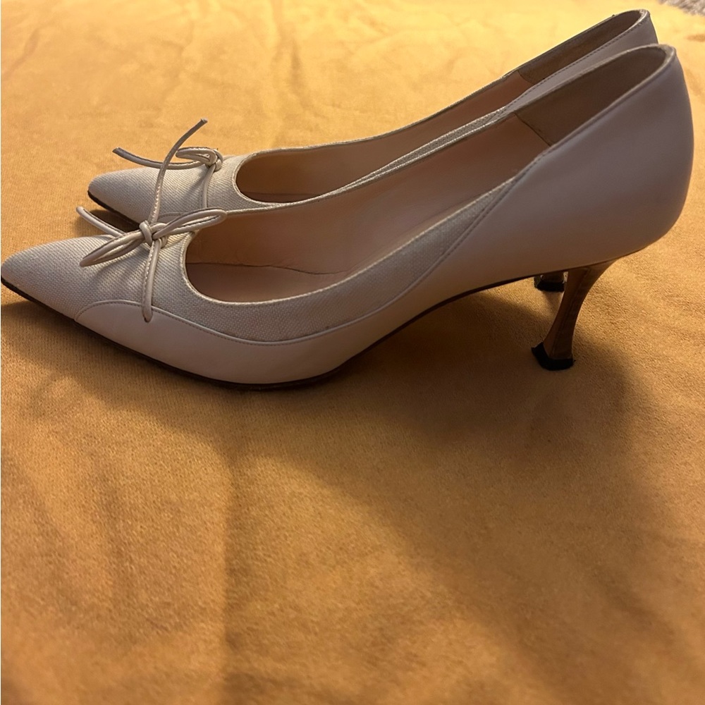 Manolo Blahnik cream colored leather with wood heel & tie pumps